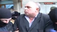 Nicuşor Constantinescu dus încătuşat în arestul Poliţiei (video)