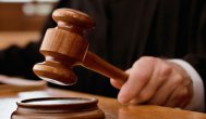 Subinspector de poliţie din Bucureşti, trimis în judecată în stare de arest