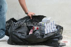 UPDATE Percheziții la o instituție publică! Traficanți de țigări, prinși cu tehnică antispionaj