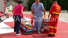  Accident stupid la Medgidia. Rezervorul unei mașini de tuns iarbă a explodat. O femeie cu arsuri de 50% a ajuns la spital  (galerie foto) 