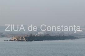 Peisaj de iarnă la malul mării. Imagini deosebite surprinse în Portul Constanța după prima ninsoare din acest an (fotoreportaj)