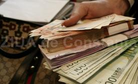 O nouă depreciere pentru moneda națională în raport cu euro și dolar